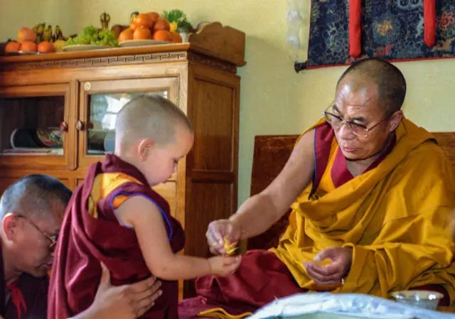 Osel and His Holiness the Dalai Lama- Tenzin Ösel Hita, recognized as the reincarnation of Lama Thubten Yeshe. In April 1986, he was presented to His Holiness the Dalai Lama. During this meeting, the Dalai Lama performed traditional tests and subsequently confirmed Ösel as the unmistaken reincarnation of Lama Yeshe.